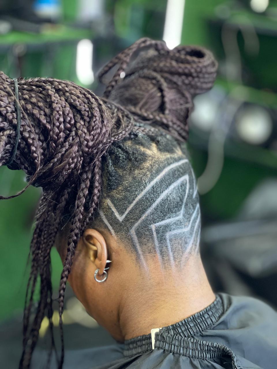 Intricate geometric hair design with braids